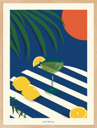 Affiche Apéritivo 30x40 cm avec citrons, verre à cocktail vert, feuillage tropical et rayures bleu marine encadrée.