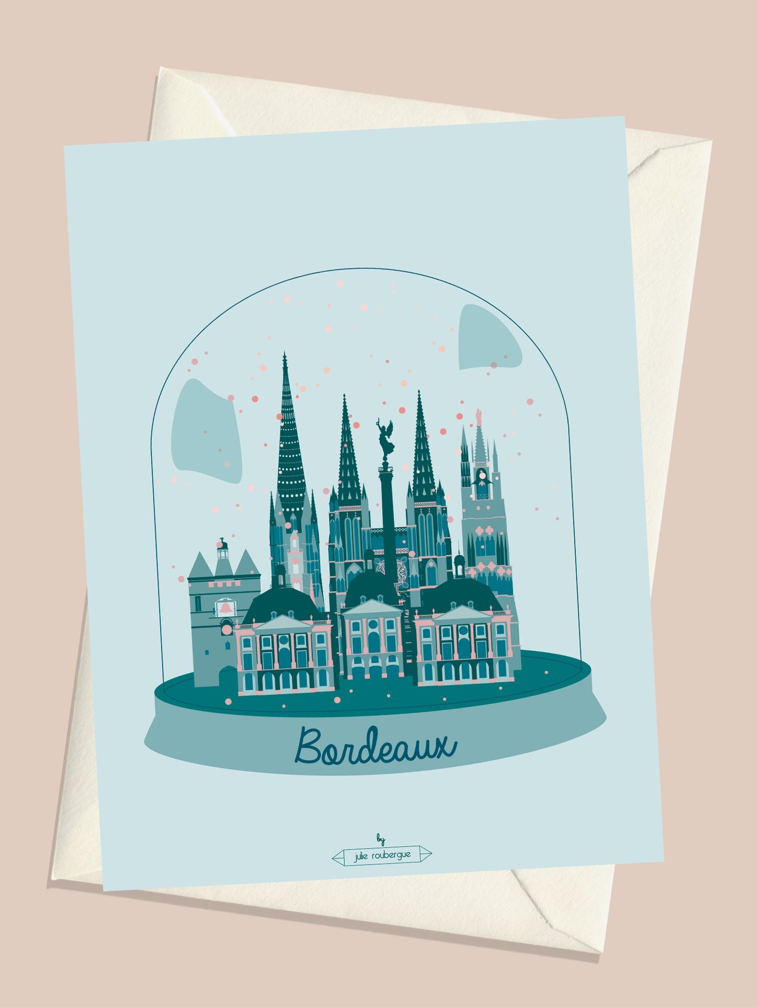 Carte postale illustrée intitulée “Bordeaux en Hiver" par Julie Roubergue, représentant les monuments emblématiques de Bordeaux dans une boule de neige.