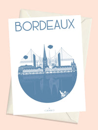 Carte postale illustrée intitulée “Bordeaux, La Ville” par Julie Roubergue, représentant de façon graphique les monuments emblématiques de Bordeaux en bleuet.