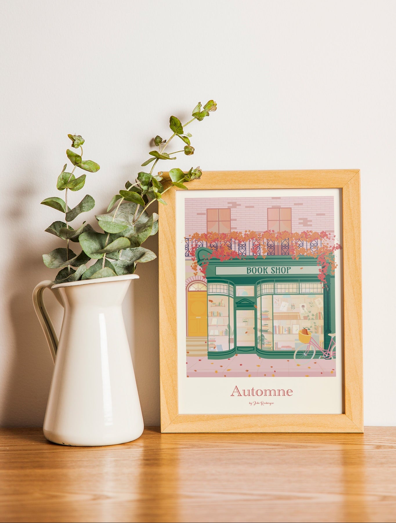 Carte postale Boutique Littéraire – Automne en Ville encadrée dans un intérieur lumineux, décoration murale inspirée de l’automne.
